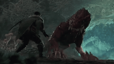 A Man Is Standing Next To A Red Monster In A Cave . GIF