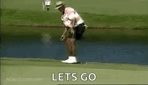 A Man Is Standing On A Golf Course Holding A Golf Club In His Hand . GIF
