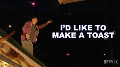 A Man Is Standing On A Roof With The Words " I 'D Like To Make A Toast " Behind Him GIF