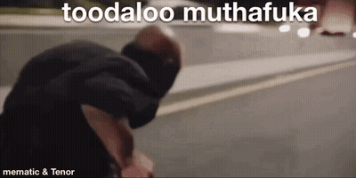 A Man Is Standing On The Side Of The Road With The Words Toodaloo Muthafuka Above Him . GIF