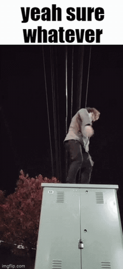 A Man Is Standing On Top Of A Utility Box With The Words Yeah Sure Whatever Above Him GIF