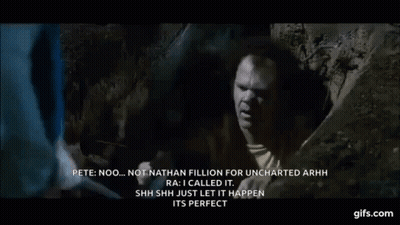 A Man Is Sticking His Head Out Of A Hole And Talking To Another Man . GIF