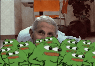 A Man Is Surrounded By Green Frogs With Big Eyes GIF