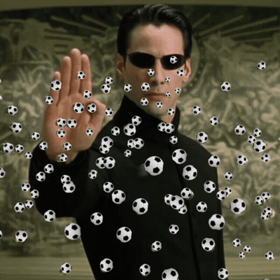 A Man Is Surrounded By Soccer Balls And Making An Ok Sign GIF