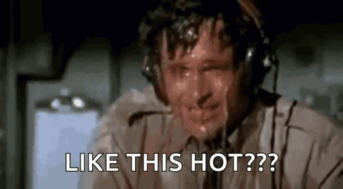 A Man Is Sweating While Wearing Headphones And Says `` Like This Hot ? '' GIF