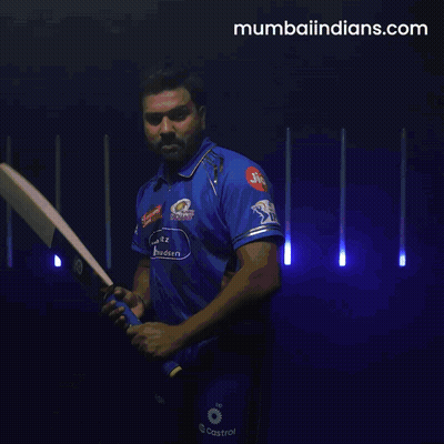 A Man Is Swinging A Bat With A Jio Logo On His Shirt GIF