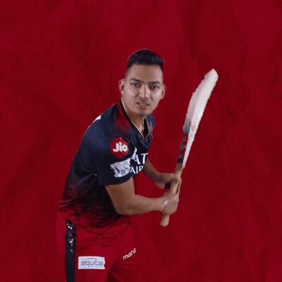 A Man Is Swinging A Cricket Bat With A Red Background And A Shirt That Says ' Cricket ' On It GIF