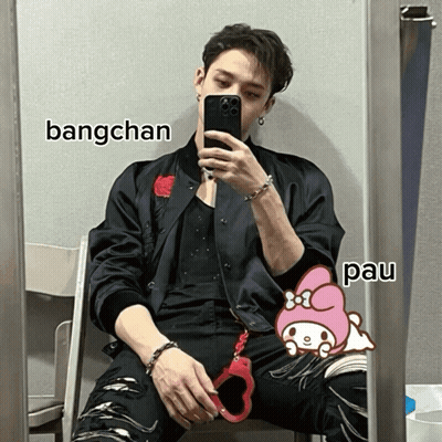 A Man Is Taking A Picture Of Himself In Front Of A Mirror With Bangchan And Pau Written On The Bottom GIF
