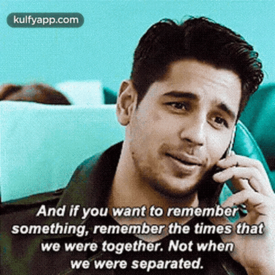 A Man Is Talking On A Cell Phone And Has A Quote On It . GIF