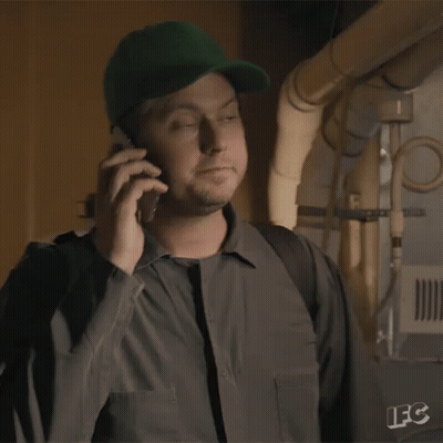 A Man Is Talking On A Cell Phone And Saying I 'M In GIF