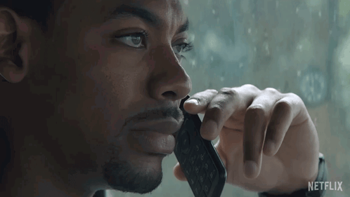 A Man Is Talking On A Cell Phone And The Word Nah Is On The Bottom GIF