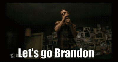 A Man Is Talking On A Cell Phone And The Words Let 'S Go Brandon Are On The Screen . GIF