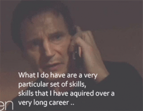 A Man Is Talking On A Cell Phone And The Words What I Do Have Are A Very Particular Set Of Skills GIF