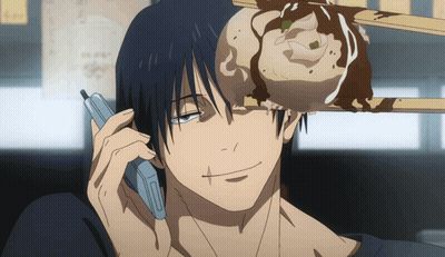 A Man Is Talking On A Cell Phone While A Dumpling Is On His Head GIF