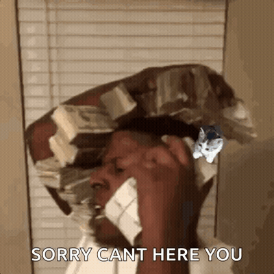 A Man Is Talking On A Cell Phone While Holding A Pile Of Money On His Head . GIF