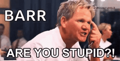 A Man Is Talking On A Cell Phone While Holding His Finger To His Forehead . GIF