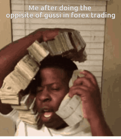 A Man Is Talking On A Phone While Holding A Pile Of Money On His Head . GIF