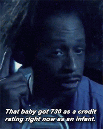 A Man Is Talking On A Phone With The Caption That Baby Got 730 As A Credit Rating Right Now As An Infant GIF