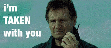 A Man Is Talking On A Walkie Talkie With The Words " I 'M Taken With You " Above Him GIF