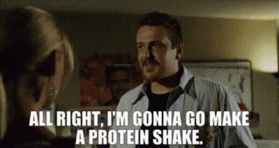 A Man Is Talking To A Woman And Says " All Right I 'M Gonna Go Make A Protein Shake " GIF