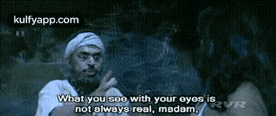 A Man Is Talking To A Woman And Says `` What You See With Your Eyes Is Not Always Real , Madam , '' GIF