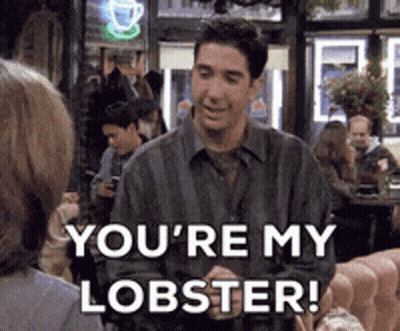 A Man Is Talking To A Woman And Says `` You 'Re My Lobster '' . GIF