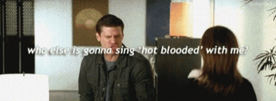 A Man Is Talking To A Woman With The Words Who Else Is Gonna Sing ' Hot Blooded ' With Me GIF