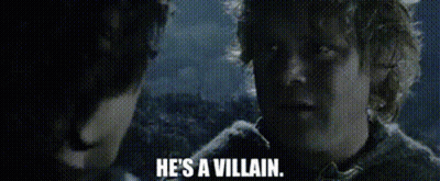 A Man Is Talking To Another Man And Says `` He 'S A Villain '' . GIF