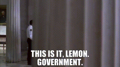 A Man Is Talking To Another Man In A Room With The Words `` This Is It , Lemon Government . '' GIF