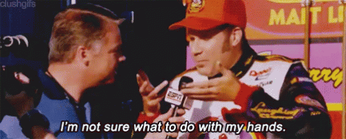 A Man Is Talking To Another Man With A Microphone And Says I 'M Not Sure What To Do With My Hands GIF