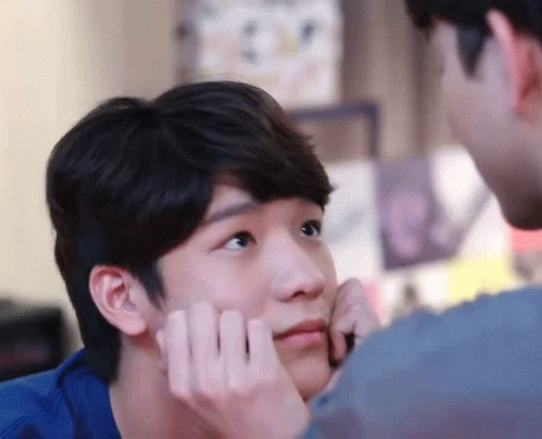 Man Touching Another Man's Face GIF