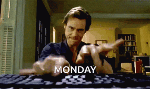 A Man Is Typing On A Computer Keyboard With The Word Monday Written On The Keyboard GIF