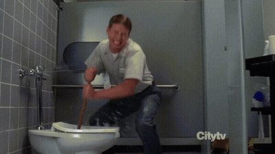 A Man Is Using A Plunger To Plunge A Toilet In A Bathroom That Is Sponsored By Citytv GIF