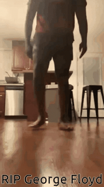 A Man Is Walking Barefoot In A Kitchen With The Words Rip George Floyd Written On The Bottom GIF