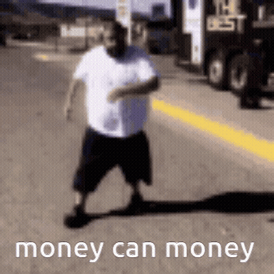 A Man Is Walking Down The Street With The Words `` Money Can Money '' Written On The Bottom . GIF