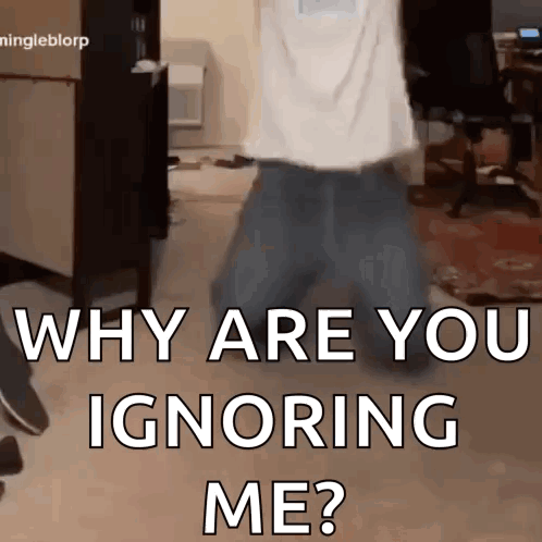 A Man Is Walking In A Room With The Words " Why Are You Ignoring Me " GIF