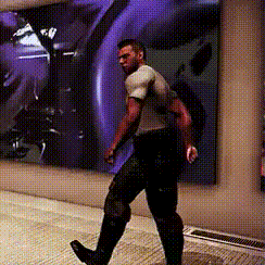 A Man Is Walking In Front Of A Purple Wall GIF