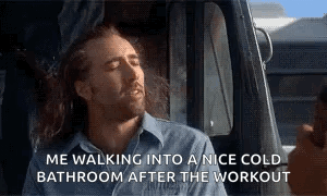 A Man Is Walking Into A Nice Cold Bathroom After A Workout GIF
