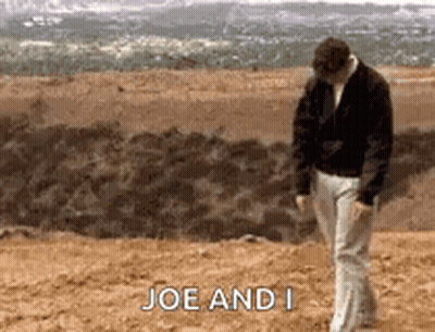 A Man Is Walking On A Beach With The Words Joe And I On The Bottom . GIF