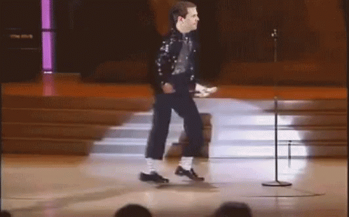 Man Walking On Stage With Microphone GIF