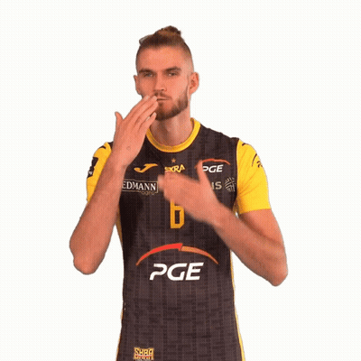 A Man Is Wearing A Black And Yellow Shirt With The Number 6 On It GIF