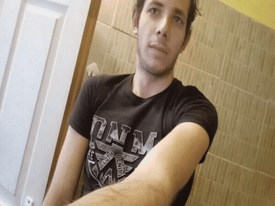 A Man Is Wearing A Black Shirt That Says Denim On It GIF