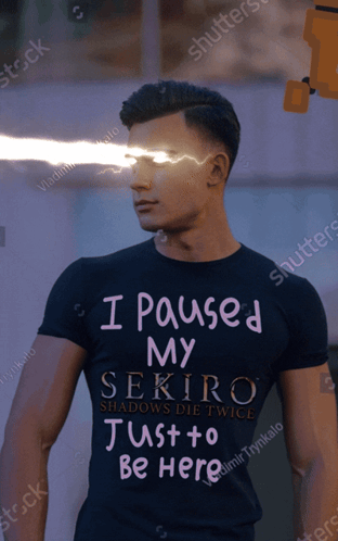 A Man Is Wearing A Black Shirt That Says I Paused My Sekiro Just To Be Here GIF
