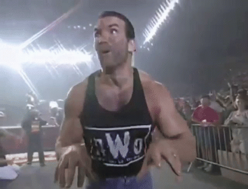 A Man Is Wearing A Black Tank Top With The Word Nwo On It GIF