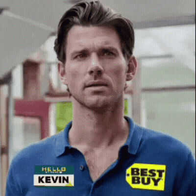A Man Is Wearing A Blue Shirt With A Best Buy Sticker On It GIF