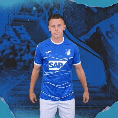 A Man Is Wearing A Blue Shirt With The Word Sap On It GIF