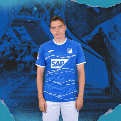 A Man Is Wearing A Blue Shirt With The Word Sap On It GIF