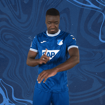 A Man Is Wearing A Blue Shirt With The Word Sap On It GIF