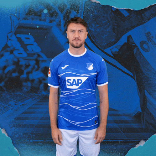 A Man Is Wearing A Blue Shirt With The Word Sap On It GIF
