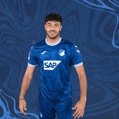 A Man Is Wearing A Blue Shirt With The Word Sap On It GIF